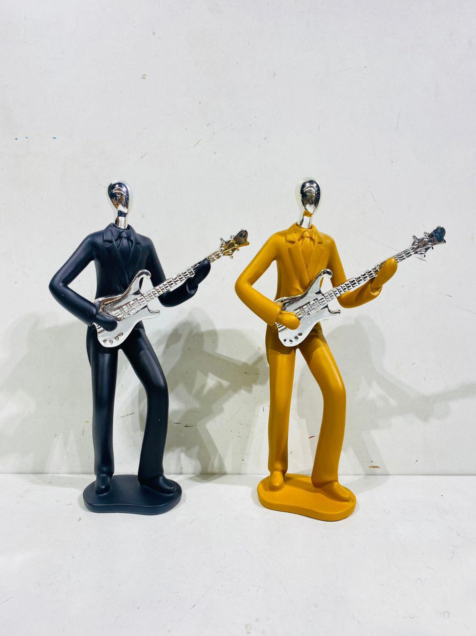 MEN PLAYING GUITAR